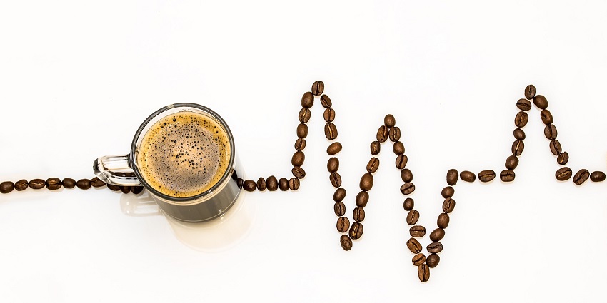 Filter Coffee, made up of crushed coffee beans and hot water served in a glass tableware.