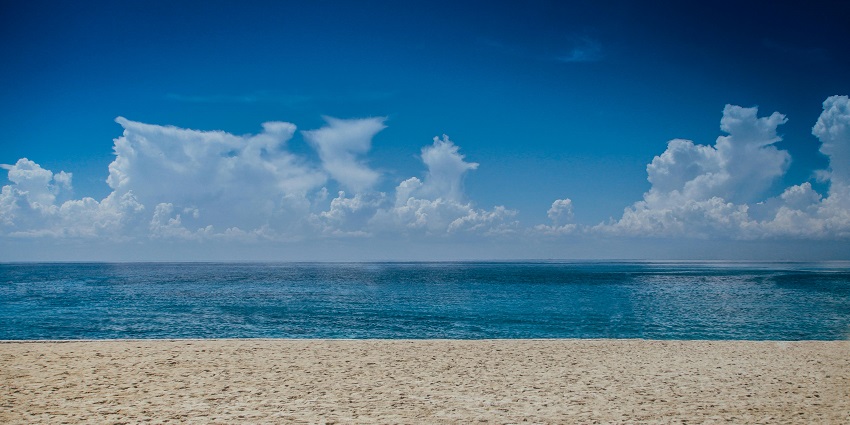 Bright ocean view during daylight, reminiscent of secluded beaches in Nashik.