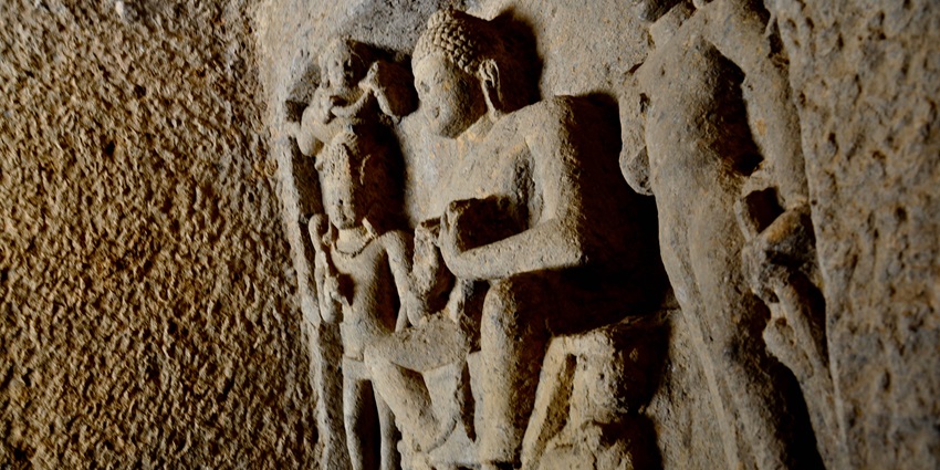 A stunning view of buddhist ancient cave having sculpture near Mauli Water Park.