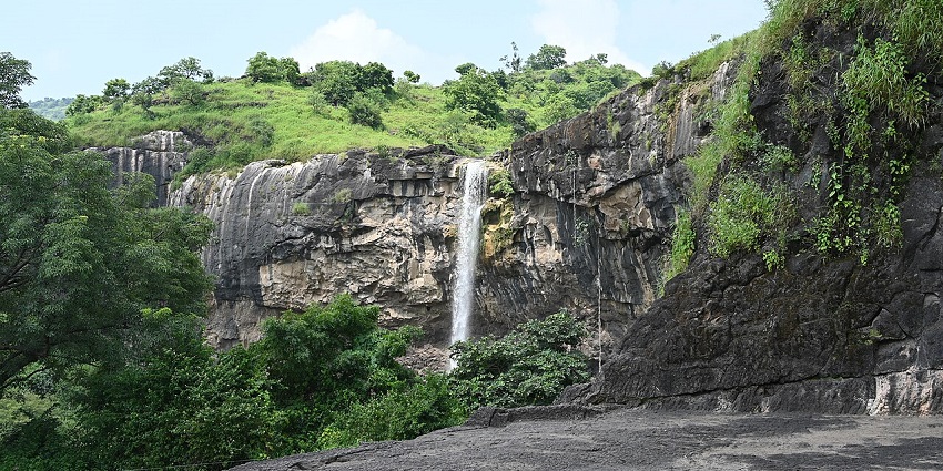 Scenic image of the beautiful waterfall descending down in the forest–Thinsg To Do in Gugagar