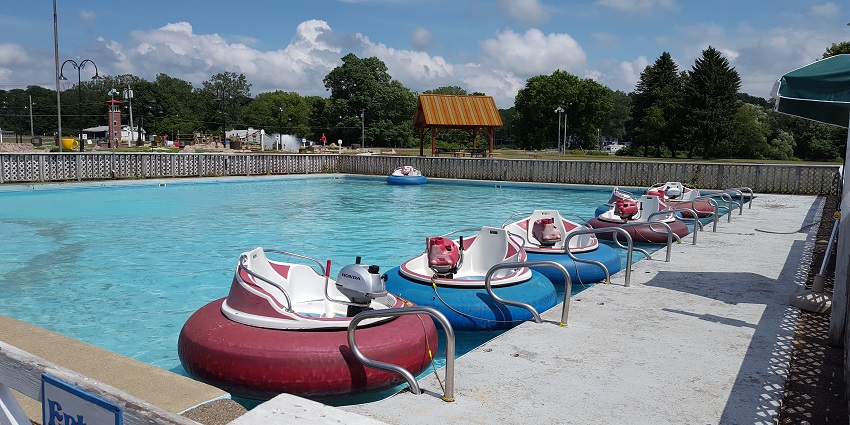 An image of bumper boats all set for people to ride, one of the best Malvan Water Sports.