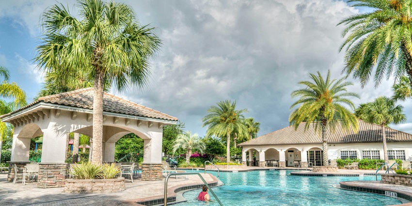 A serene view of a resort with a pool near Jaipur.