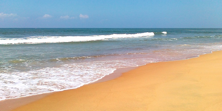 Image of Candolim Beach, a place to visit near Reis Magos Fort has golden sands