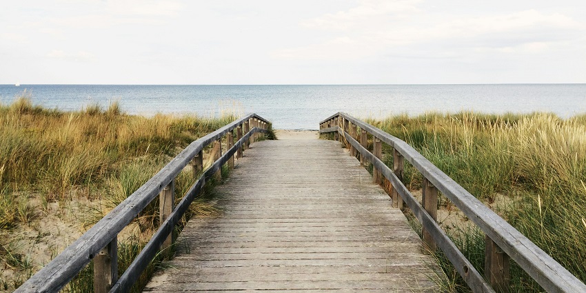The image of the Carter Road Promenade, a seaside walkway offering scenic views.