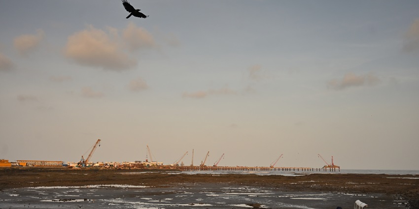 Carter Road promenade in Mumbai, with seaside walkway and urban backdrop.