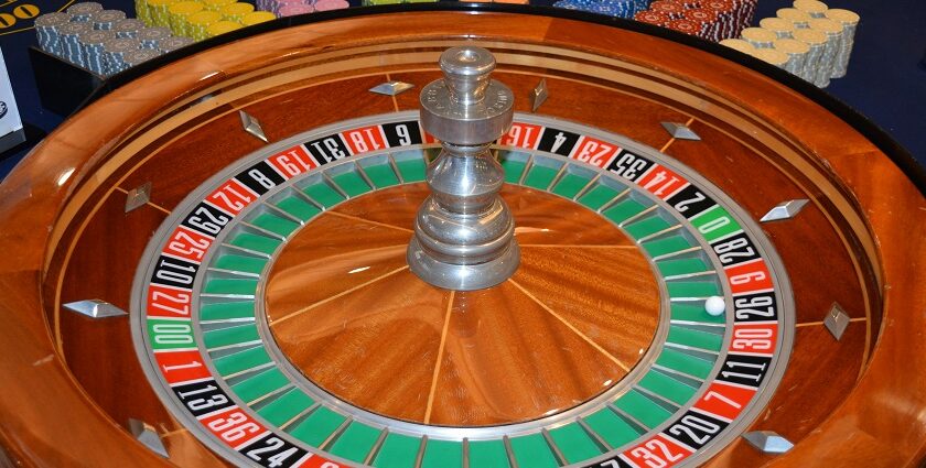 Luxury casino with slot machines and gaming tables, offering entertainment in Delhi.