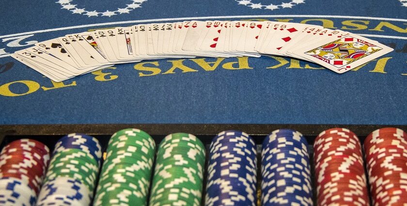 Coins stacked and cards laid before a gaming session at the casinos in Nepalgunj