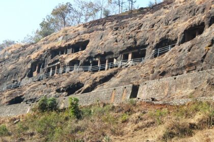 A glimpse of a famous tourist attraction featuring majestic peaks and lush greenery.