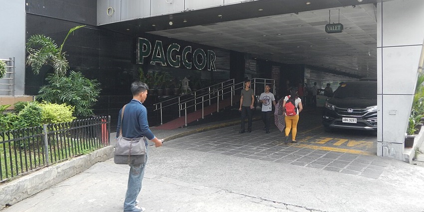 People entering a Casino in Manila, excited for the experience.