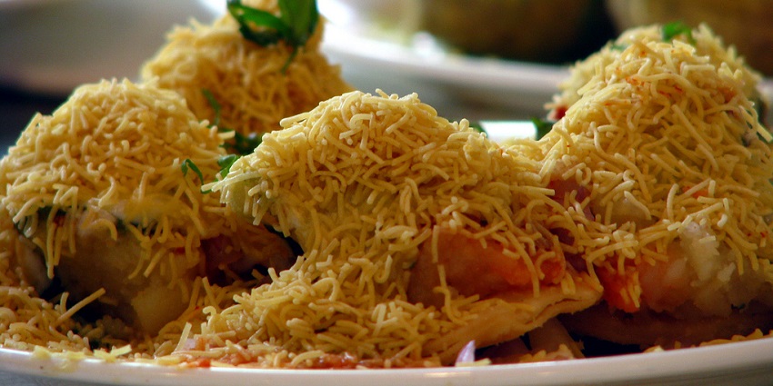 A street food in Andheri - crispy round puri, stuffed with potatoes and chutneys.