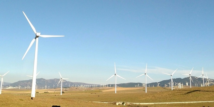 Vast wind energy site harnessing sustainable power generation through several windmills.