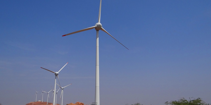 Chalkewadi Windmill Farms feature vast windmills with scenic, green landscapes.
