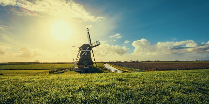 Chalkewadi Windmill Farms offers scenic views of hilltops with windmills and greenery.