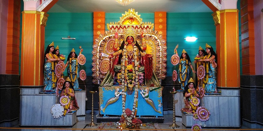 An idol of Maa Chandi in the centre with various other female deities surrounding her