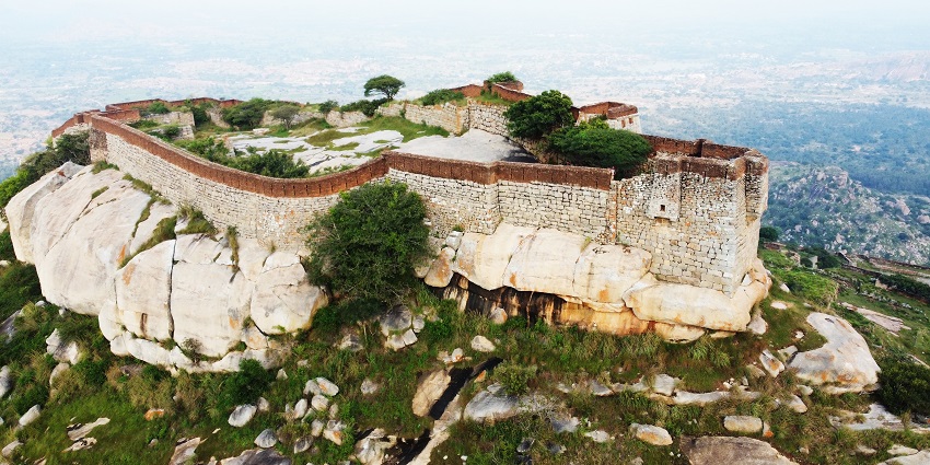 Aerial view of Channarayana Durga, featuring rugged terrain and lush greenery.