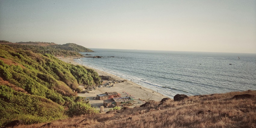 The majestic Chapora Fort overlooking the serene Arabian Sea, steeped in history.
