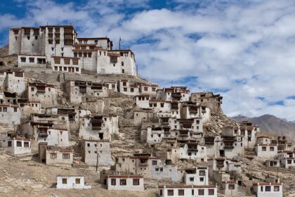 Image of Chemrey Gompa viewed from the southwest on top of the hill under clear blue sky