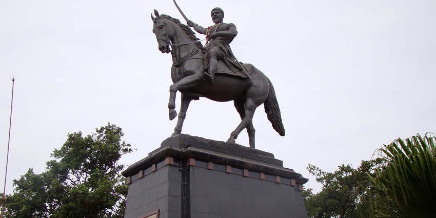Majestic statue of Chhatrapati Shivaji Maharaj, symbolizing bravery.