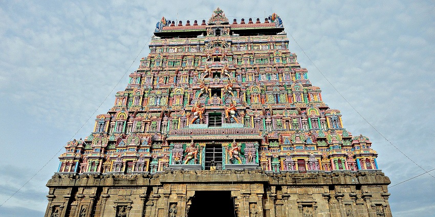 A view of the iconic Chidambaram featuring idols of god adorned with vibrant colours.