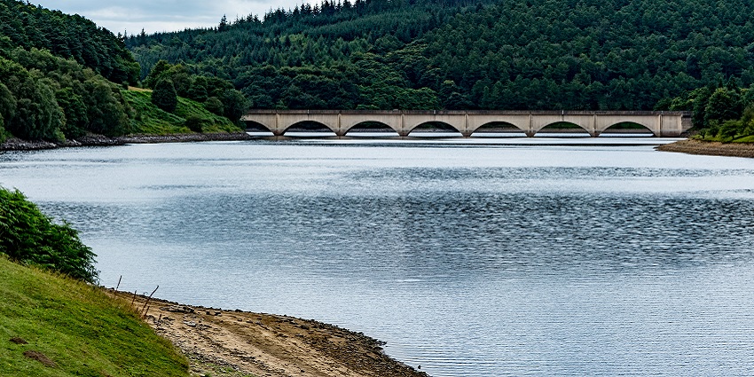 A breathtaking vista of Chiklihole Reservoir featuring shimmering waters and greenery.