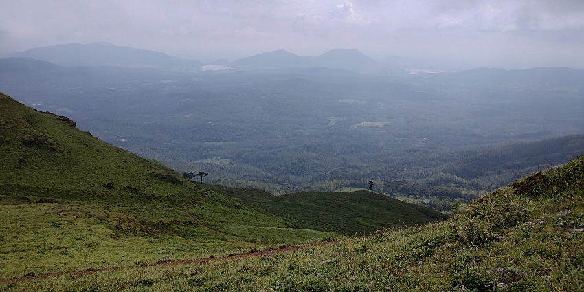 Chikmagalur, a top place to visit in August in Karnataka, offers lush greenery and stunning views.