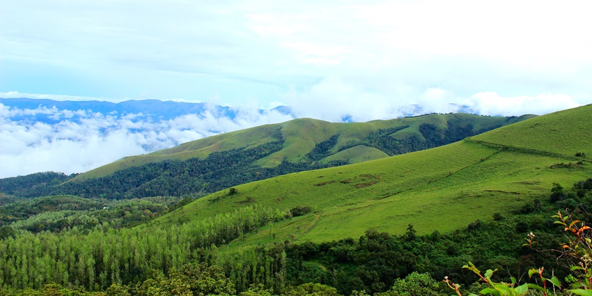 A picture of a green mountain, which is one of the best places to visit in march near Bangalore