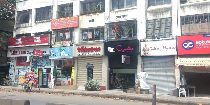 A view of scenic pathways in Koregaon Park, Pune, lined with trees