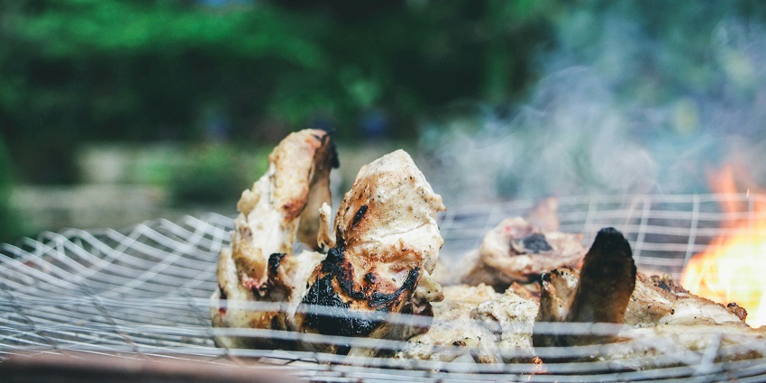 A glimpse of delicious chicken being grilled in the plush lawns at the Chill N Grill.