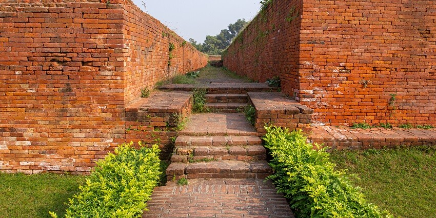 The beautifully carved walls and the garden in the Chinese Bodh Gaya Monastery in Bihar.