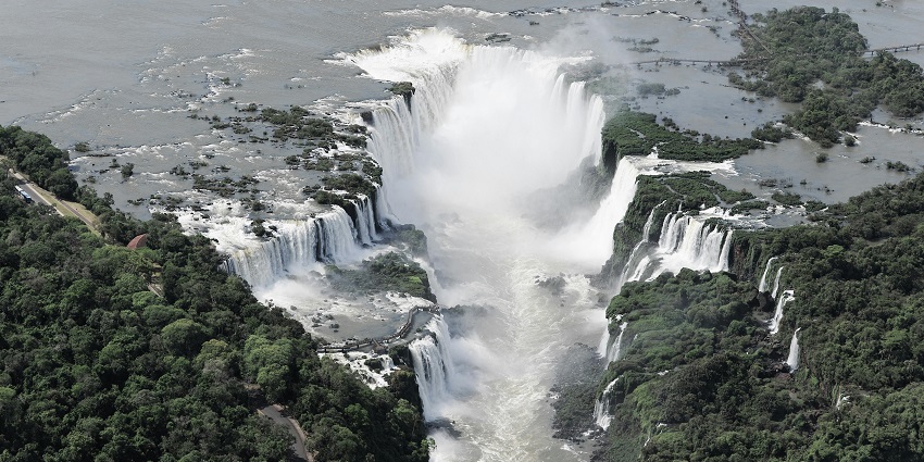 An image of the stunning waterfalls, cascading through many tiers on a rocky terrain.