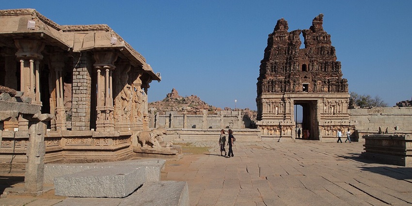 A sacred temple featuring mural paintings depicting mythological stories from Ramayana and Mahabharata.