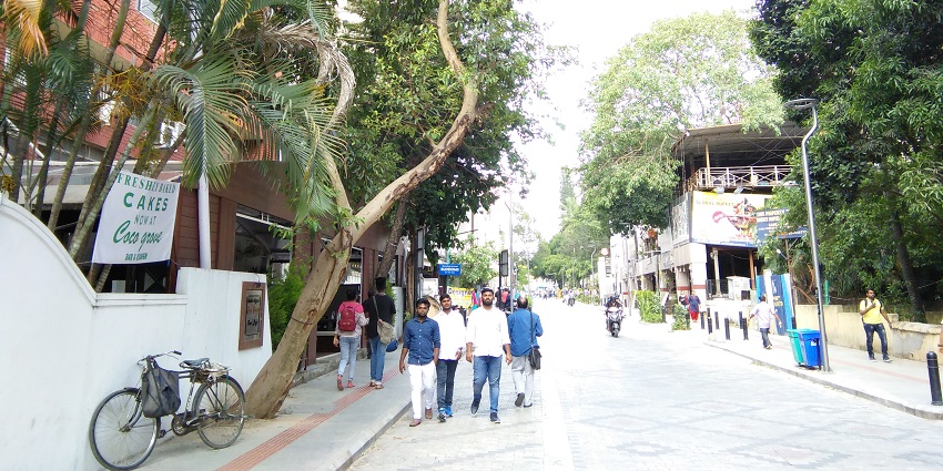 View of a road in Church Street, one of the places to visit in Bangalore at night.