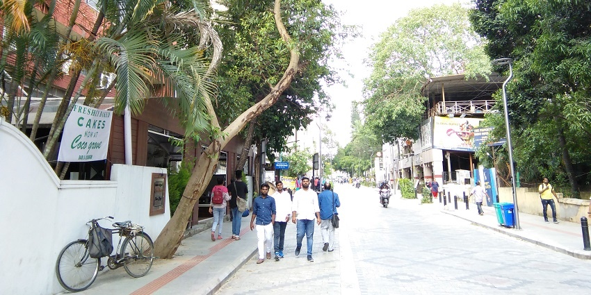 The pathway of the church street in Bangalore, with people walking around