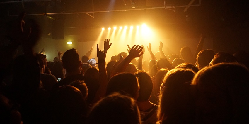 Energetic nightclub featuring dance floors and live DJ performances.