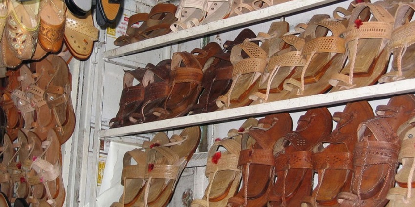 Pick up locally made Kolhapuri chappals at the Colaba Market while shopping in Alibaug.