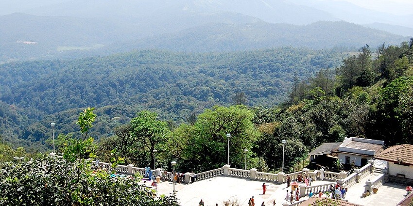 Misty hills make Kodagu a perfect place to visit in April in Karnataka.