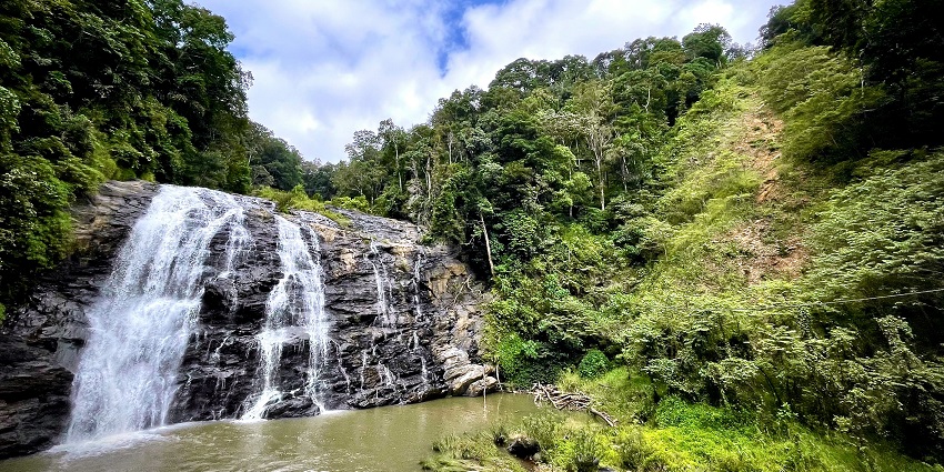 Coorg in Karnataka offers misty hills, coffee farms, vibrant culture, and wildlife safaris.
