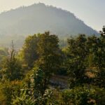 An image of the serene Tanasa River with a bridge in between at a location near Palghar.