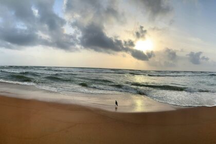 A breathtaking view of the prsitine golden sands and shimmering waters of Goa.