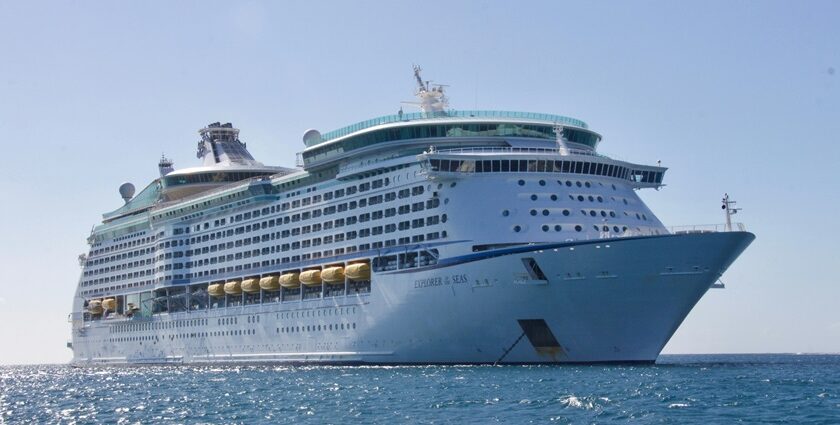 A view of a gigantic ship sailing through the shimmering blue waters in the region.