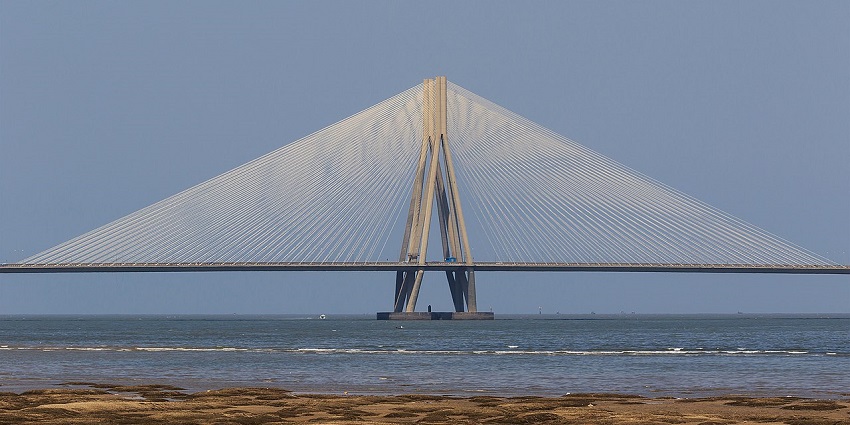 A lively view of Dadar Beach with families enjoying the sunset and beach games, is one of the famous beaches in Vasai.