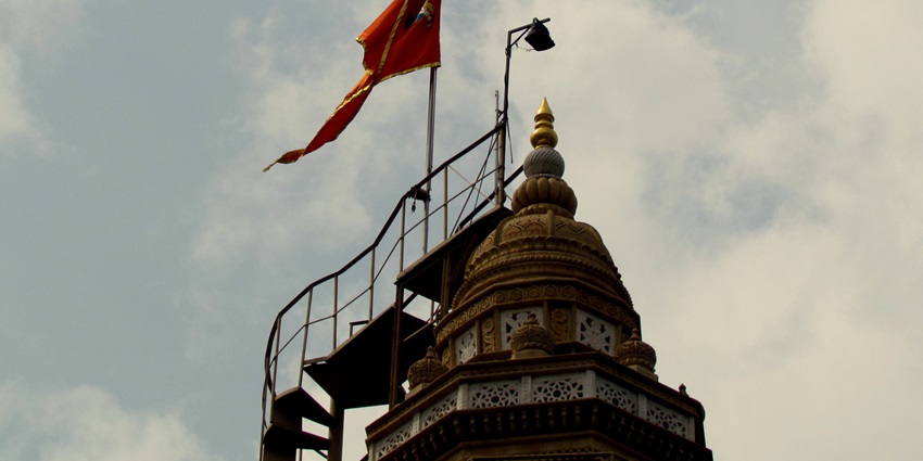 Shikhara of Dagdusheth Halwai Ganpati Temple, a popular destination nearby