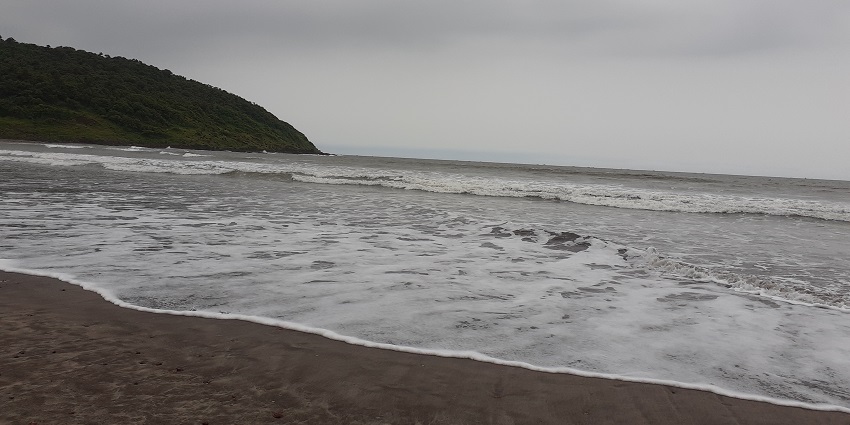 A scenic view of the Dapoli Beach,a famous place near Panhalekaji Caves.