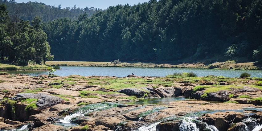 Pykara Lake’s calm waters and cascading waterfalls for boating