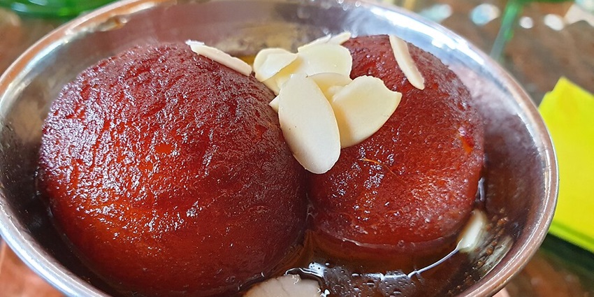 Delicious Gulab jamun dessert, a must-try treat in Madura