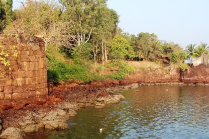 The aerial view of Devgad Fort with its fortifications overlooking the Arabian Sea