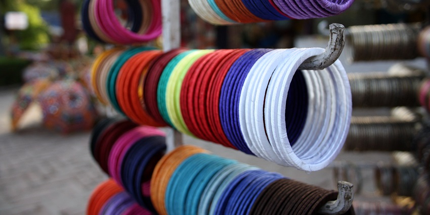 A set of beautiful multicoloured bangles displayed in the vibrant Dilli Haat market.