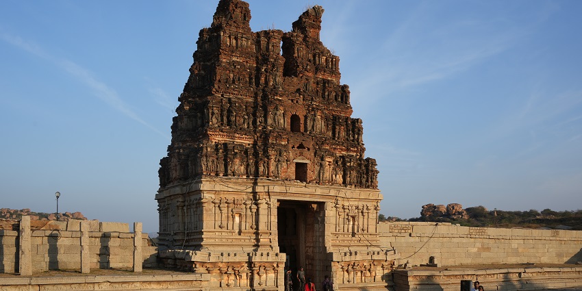 A view of Vittala Temple, renowned for its stone chariot and musical pillars in Hampi.