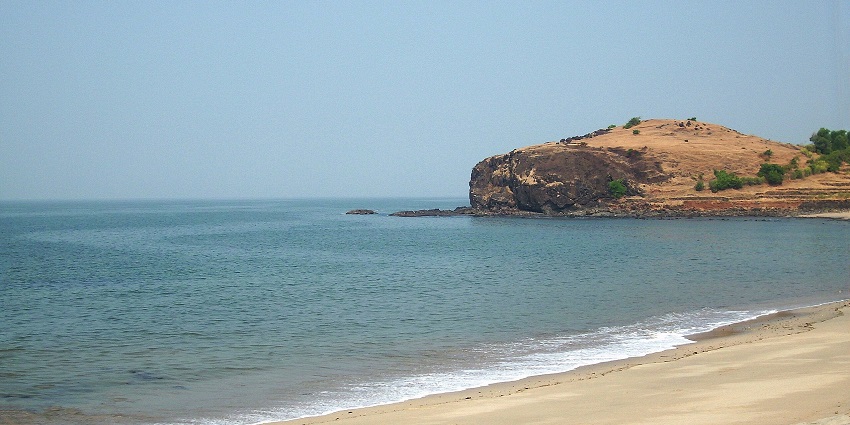 Scenic view of Diveagar Beach, showcasing its tranquil waves and golden sands among beach near Nashik .