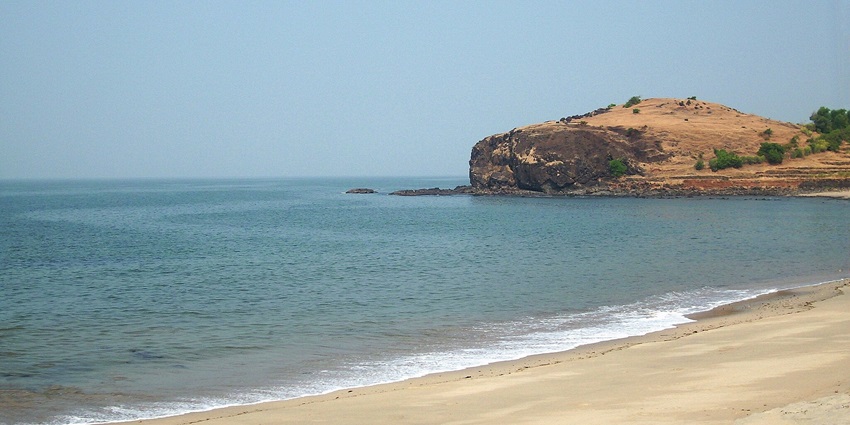 A tranquil view of Diveagar Beach, considered one of the best beaches near Pune, with soft sands